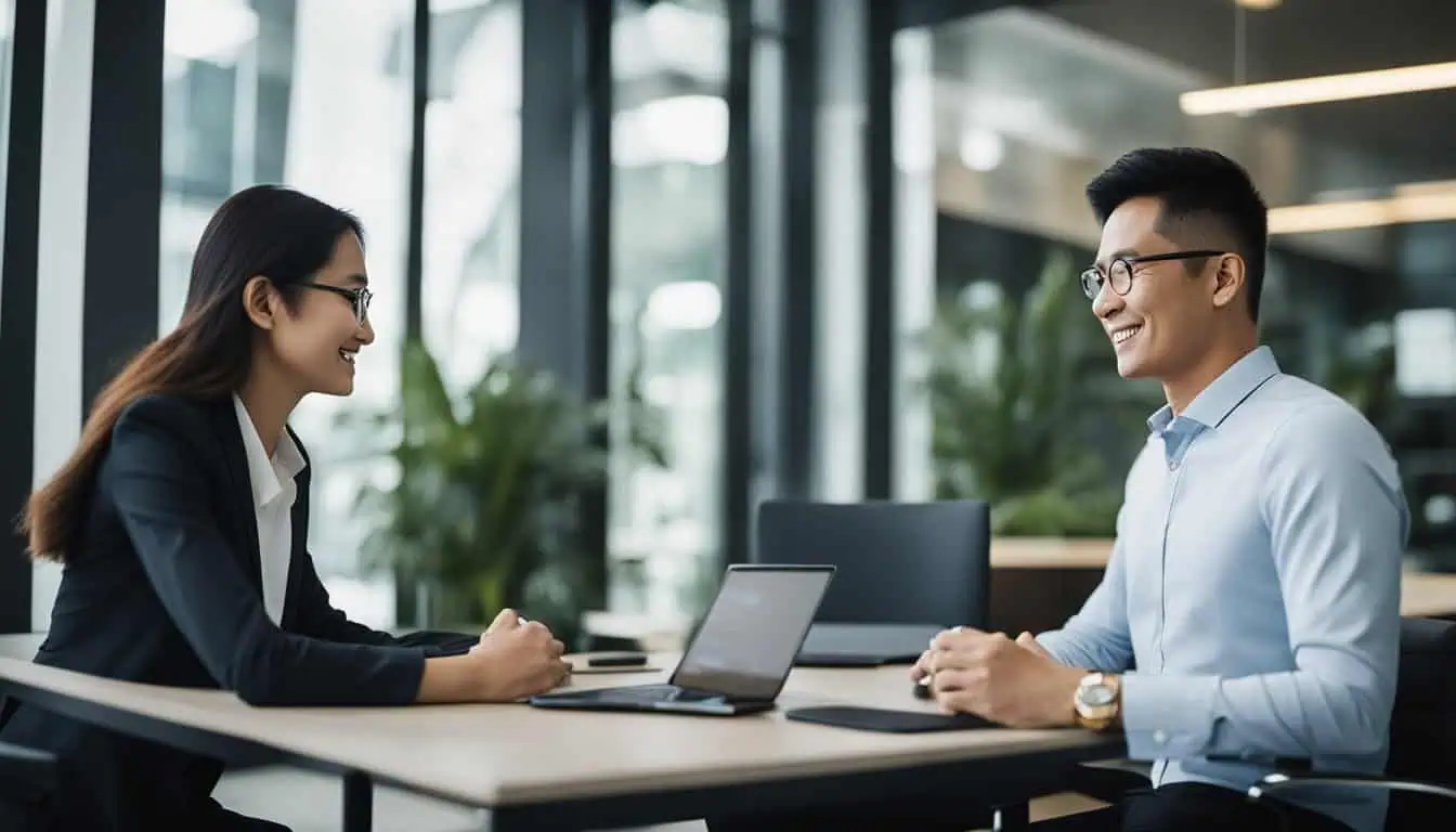 Two business professionals are having a discussion at a table, showcasing collaboration within Singapore's loan industry.