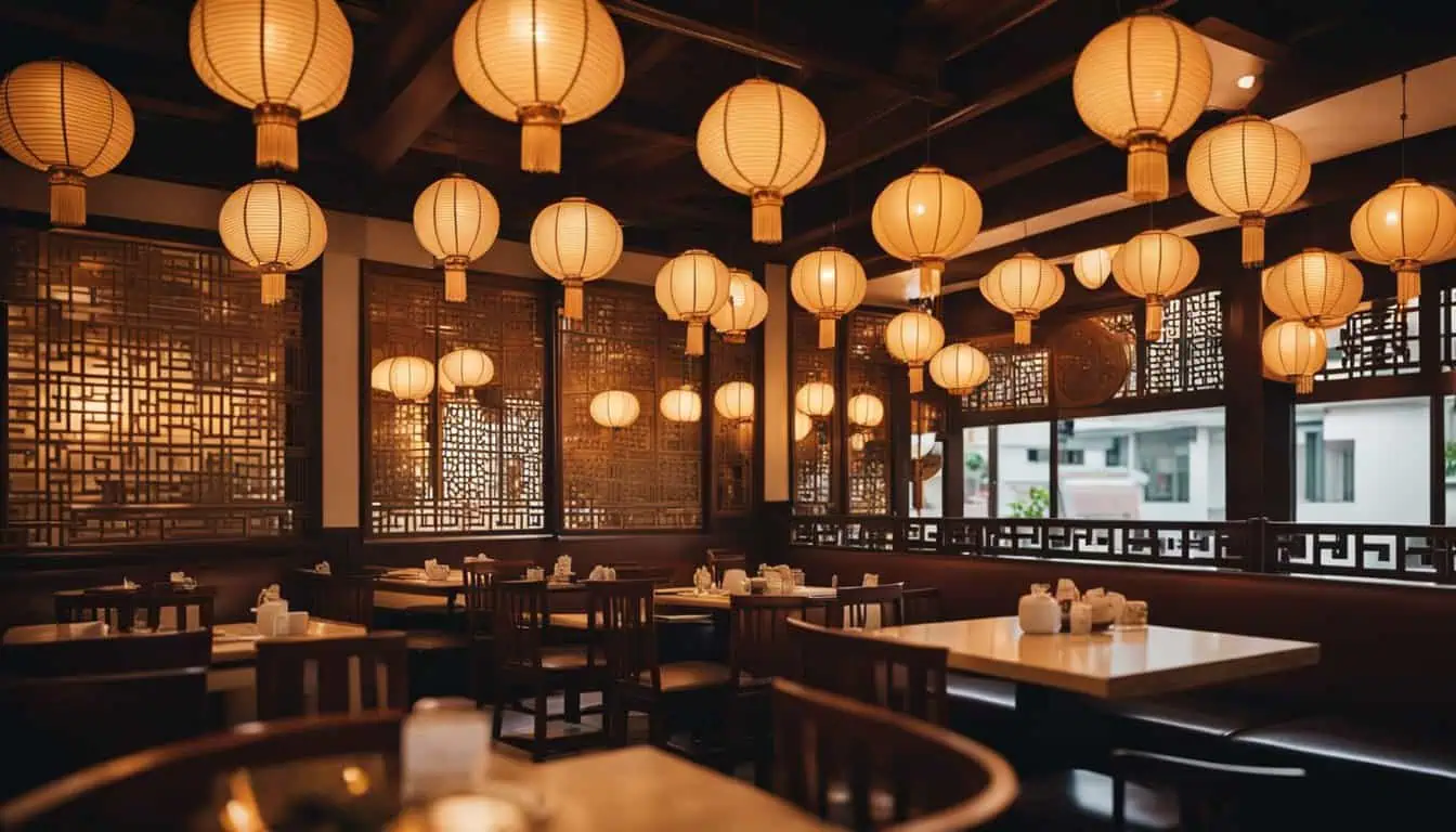 A bustling restaurant featuring numerous tables and chairs, showcasing the best Chinese cuisine in Singapore.