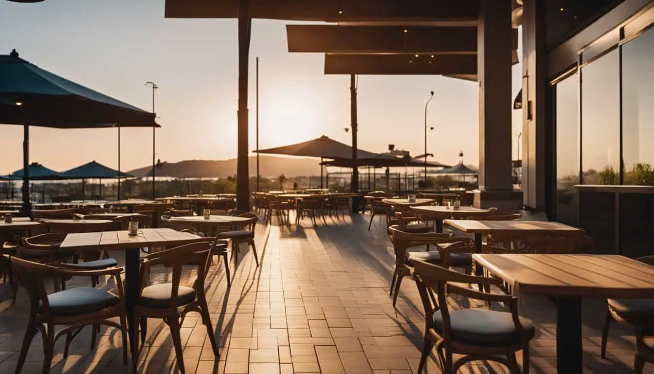 Outdoor dining area at CHIJMES, Singapore, featuring tables and chairs in a vibrant restaurant setting.