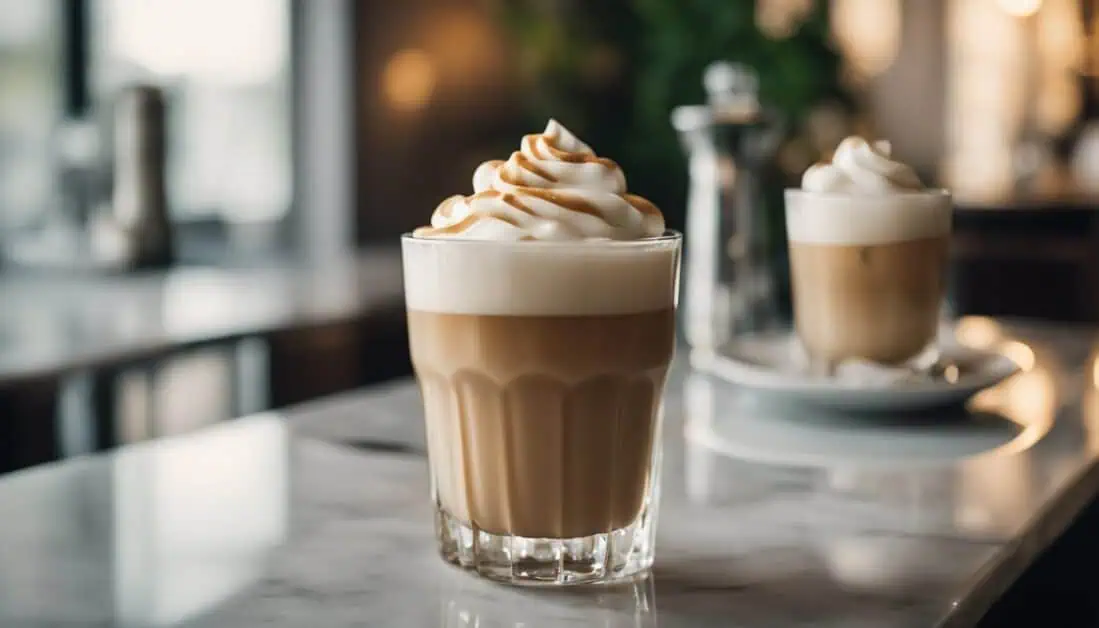Two glasses of coffee topped with whipped cream, featured at Tiong Bahru Market, Singapore's top food destination.